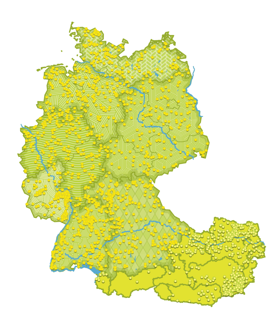 Eine Karte von Deutschland und Österreich mit gelb markieren Punkten, die anzeigen, wo es überall Gastgeber und Bauernhöfe gibt, die bei Landvergnügen mitmachen und wo man mit dem Camper und der Landvergnügen Mitgliedschaft kostenlos übernachten kann